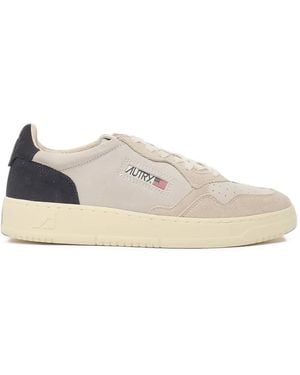 Autry Perforated Paneled Suede Sneakers - White