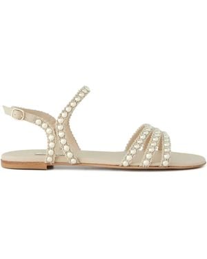 Casadei Flache Sandalen mit Nieten - Natur