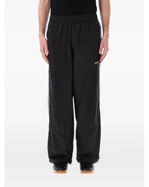 PUMA Pantalones de chándal King - Negro