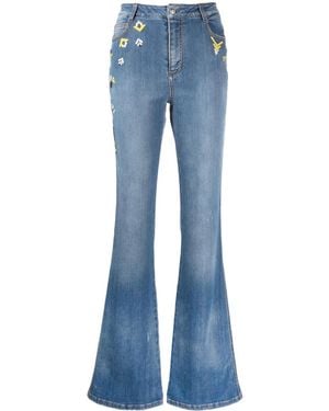 Ermanno Scervino Vaqueros acampanados con bordado - Azul