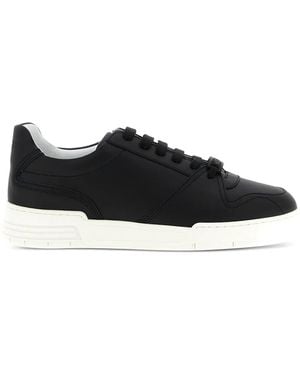 Moschino Sneakers mit Logo-Schild - Schwarz