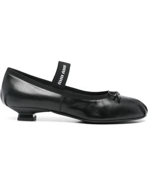 Miu Miu Bailarinas con logo en intarsia - Negro
