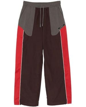 ANDERSSON BELL Logo-Patched Colour-Block Track Pants - Red