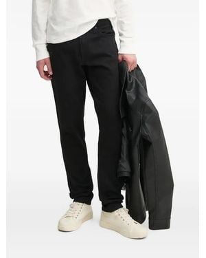 Rag & Bone Jeans mit bestickter Tasche - Schwarz