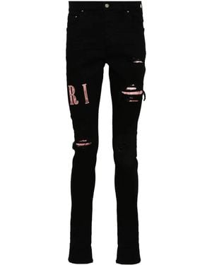 Amiri Waxed Logo-Appliqué Skinny Jeans - Black