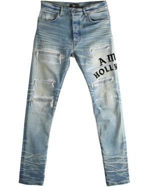 Amiri Distressed Embroidered Jeans - Blue