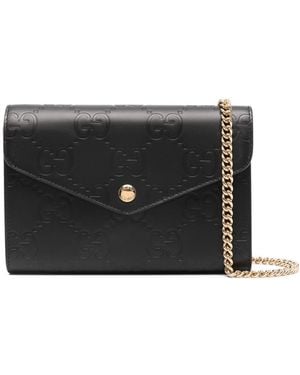 Gucci Debossed G Monogram Crossbody Bag - Black