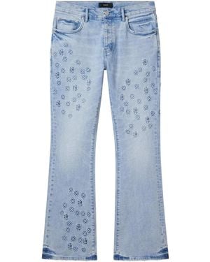 Purple Brand Monogram-Embossed Flared Jeans - Blue
