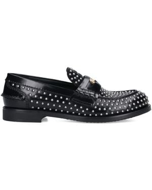 Miu Miu Mocasines penny con apliques - Negro