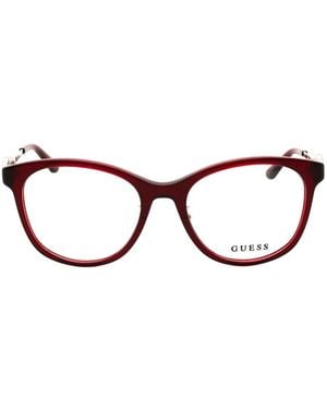 GUESS EYEWEAR Occhiali Tondi - Rosso