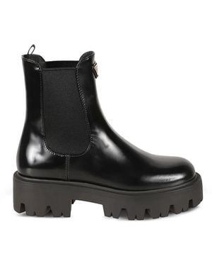 Prada Bottines En Cuir À Plaque Logo - Black