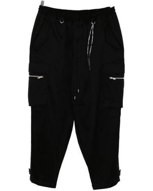 MASTERMIND WORLD Graphic-Embroidered Trousers - Black