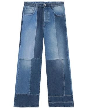 Fortela Vaqueros acampanados con diseño patchwork - Azul