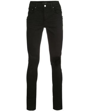 Amiri Mid Rise Distressed Skinny Jeans - Black