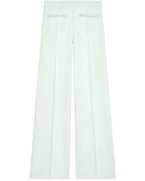 Courreges Pantalones de chándal con bolsillo y cremallera - Blanco