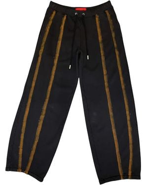 Eckhaus Latta Pantalones con cordones y rayas - Gris