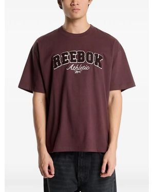 Reebok Elevated Athletic Logo-Embroidered Varsity T-Shirt
