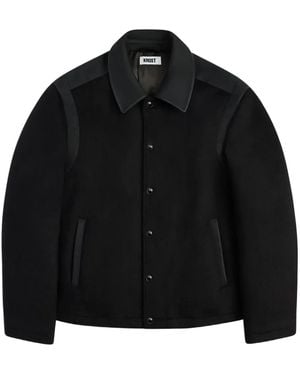 KROST Chaqueta Mercer Varsity con costuras en contraste - Negro