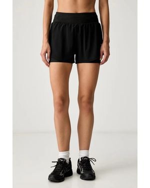 PUMA Dreamrun Drycell Layered Logo-Print Shorts - Black