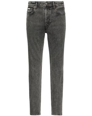 Calvin Klein Logo-Patch Acid-Wash Jeans - Grey