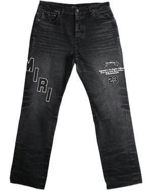 Amiri Logo-Embroidered Faded Jeans - Black