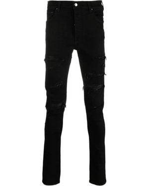 Amiri Logo-Patch Cotton-Blend Skinny Jeans - Black