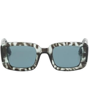 Komono Avery Zonnebril Met Rechthoekig Montuur - Blauw