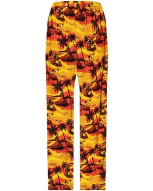 Balenciaga Pantalones estampados - Naranja