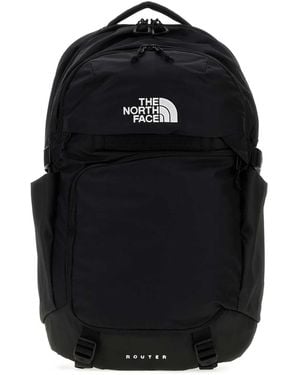 osprey hydration pack sale Women's Raven 14 Deep Fig and the magnetic bite City Adventurer Backpack *Mini Color:TNFBLACKHTR/BRNTCORALMTLC Grey
