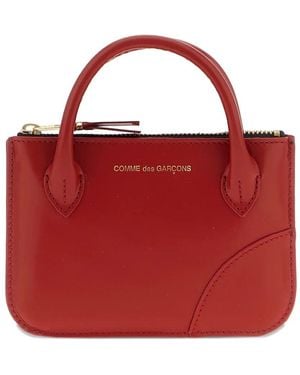 Comme des Garçons Handles - Red