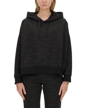 Moschino Sweatshirt With All Over Logo - Black