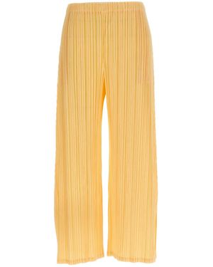 Pleats Please Issey Miyake 'Mellow Pleats' Trousers - Yellow