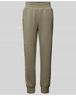 Guess Slim Fit Sweatpants Mit Label-Prints - Grün