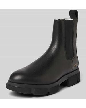 COPENHAGEN Boots aus Leder mit elastischen Einsätzen Modell 'CPH570' - Schwarz