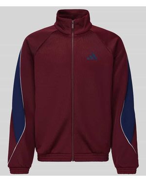 adidas Loose Fit Sweatjacke mit Baumwoll-Anteil Modell 'STADIUM' - Rot