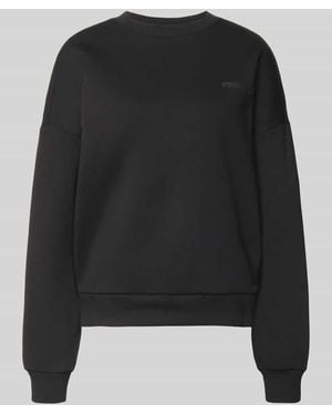 Review Basic Sweater mit Rundhalsausschnitt und Bündchen am Ärmel - Schwarz