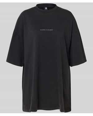Karo Kauer Oversized T-Shirt mit Label-Print - Schwarz