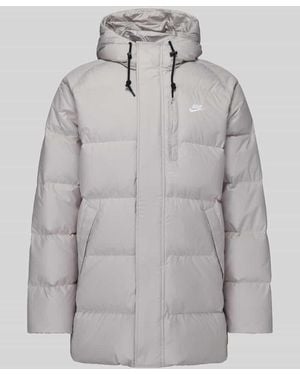 Nike Steppjacke mit Kapuze Modell 'M NK TF CLUB PARKA 650' - Grau