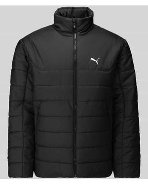 PUMA Regular Fit Steppjacke mit Logo-Print - Schwarz