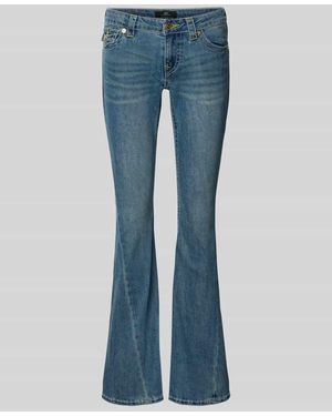 TRUE RELIGION Low Rise Flared Jeans mit Eingrifftaschen Modell 'JOEY' - Blau