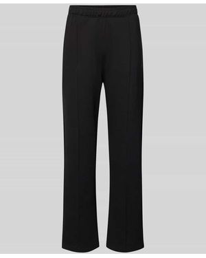 Champion Sweatpants mit Längsnähten und Label-Stitching - Schwarz