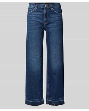 Joop! Jeans in verkürzter Passform mit Fransen - Blau