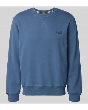 Superdry Sweatshirt mit Rundhalsausschnitt und Label-Stitching - Blau