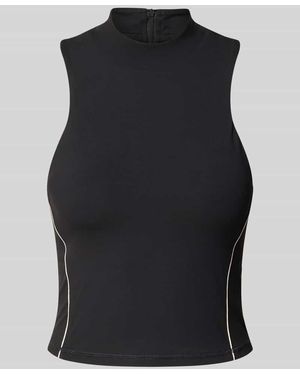Fabletics Slim Fit Top mit Kontrastnähten Modell 'Malbon' - Schwarz