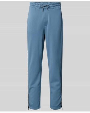 HUGO Relaxed Fit Jogginghose mit Galonstreifen Modell 'DOLOS' - Blau