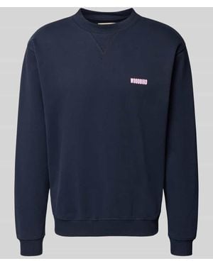 Woodbird Sweatshirt mit Label-Print Modell 'Cane Koi Crew' - Blau