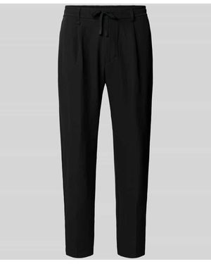 BOSS Tapered Trackpants aus wasserabweisendem Material - Schwarz
