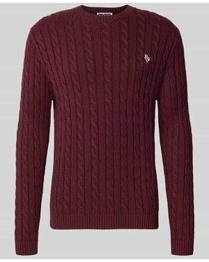 Review Slim Fit Strickpullover aus reiner Baumwolle mit Zopfmuster - Rot