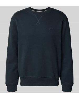 Superdry Sweatshirt mit Rundhalsausschnitt und Label-Stitching - Blau