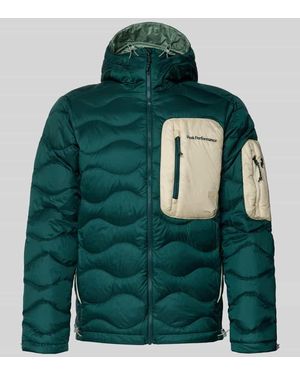 Peak Performance Daunenjacke mit Kapuze - Grün